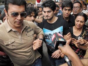 Sooraj outside court with family