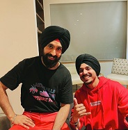 Punjabi singer Diljit Dosanjh with Balwinder Dhillon