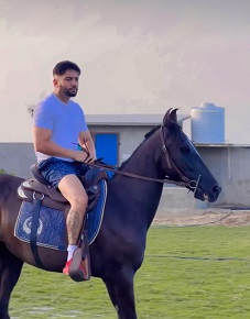 Sippy Gill riding his horse