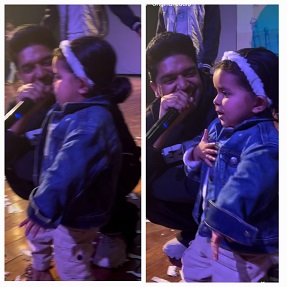 Guru Randhawa with a cute fan on stage