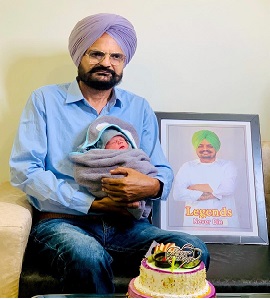 Balkaur Singh with newborn