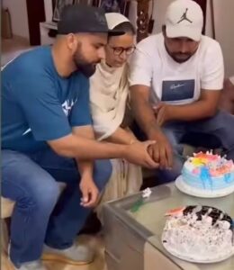 Charan Kaur cutting cake